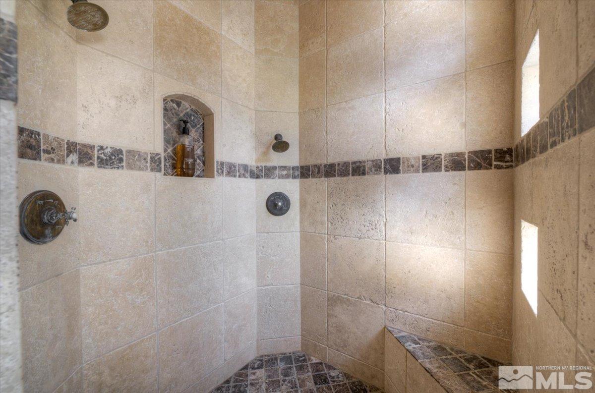 1318 Wolf Run Road Reno, NV 89511 - Photo 17 of 37 a bathroom with a shower