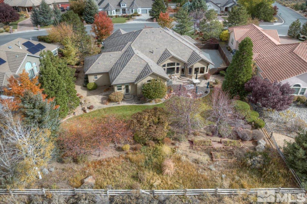 1318 Wolf Run Road Reno, NV 89511 - Photo 33 of 37 an aerial view of a house with a yard