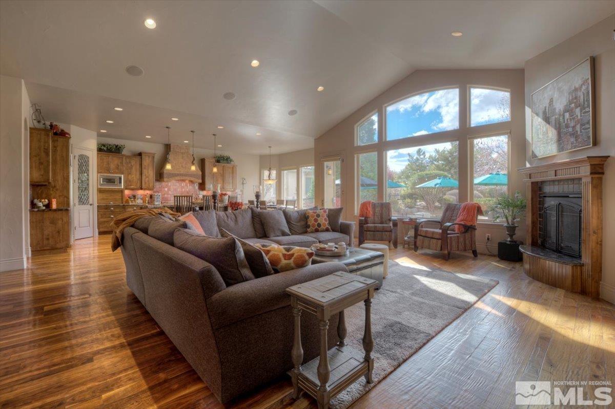 1318 Wolf Run Road Reno, NV 89511 - Photo 6 of 37 a living room with furniture and a fireplace