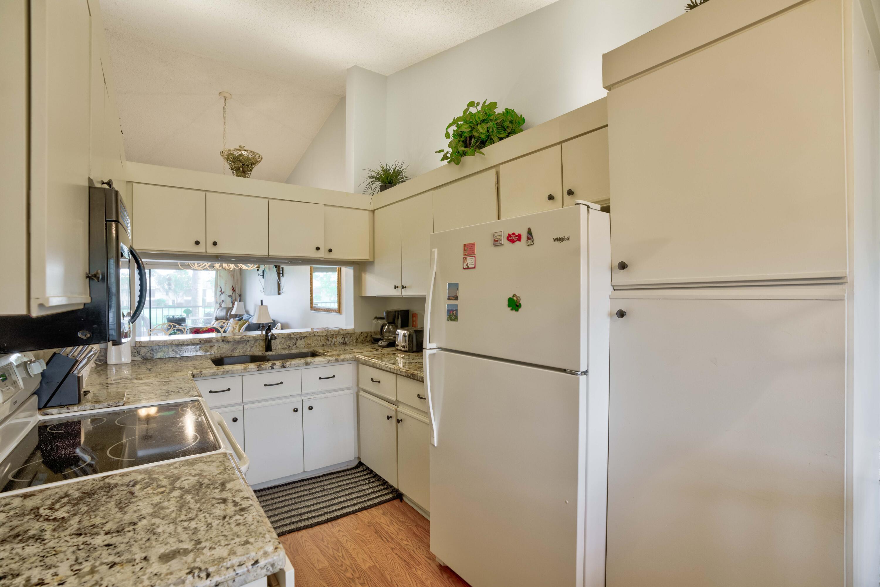 702 Pinecrest Circle, Unit E Jupiter, FL 33458 - Photo 24 of 46 55__mlp6534_5_6_7_8