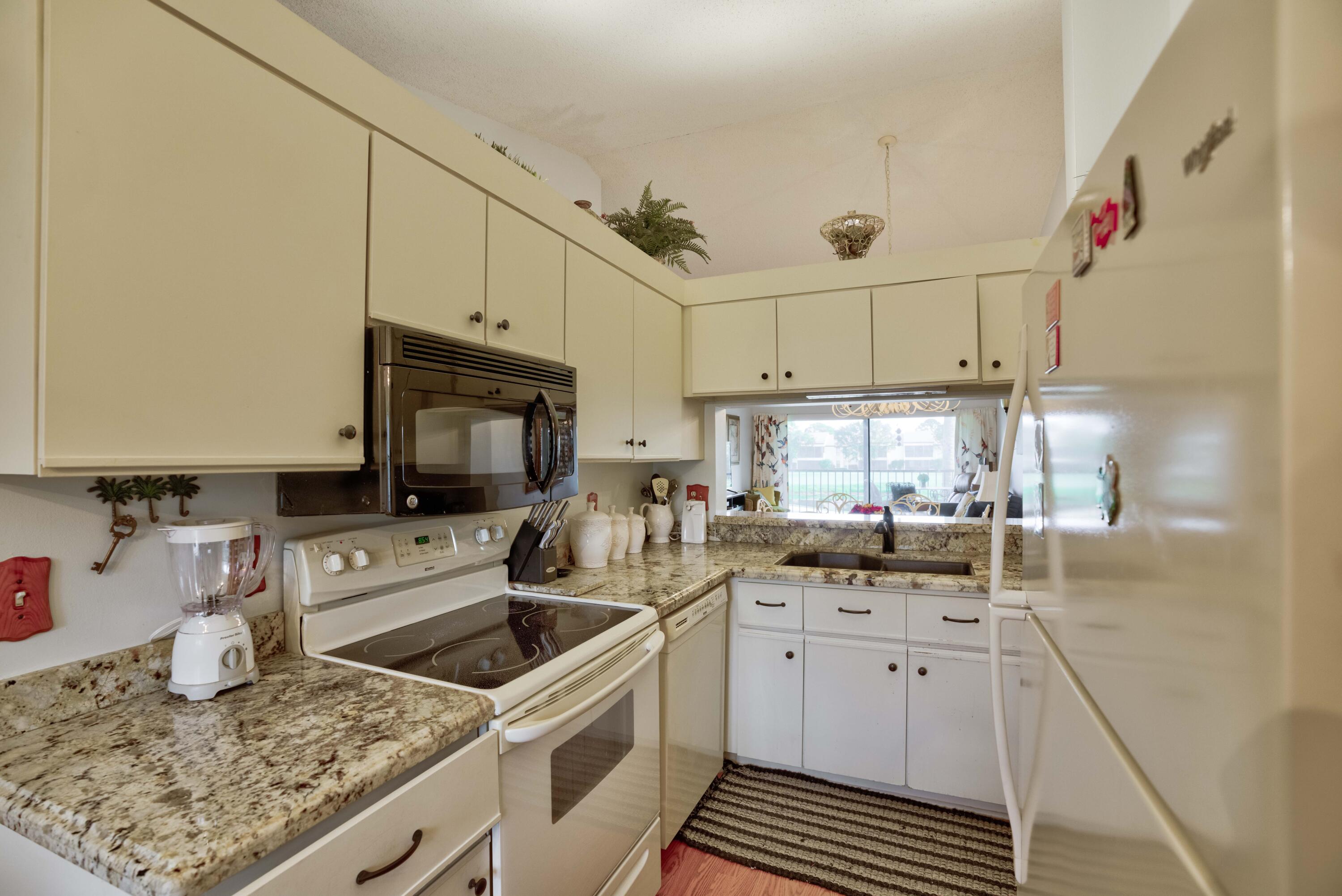 702 Pinecrest Circle, Unit E Jupiter, FL 33458 - Photo 26 of 46 57__mlp6544_5_6_7_8