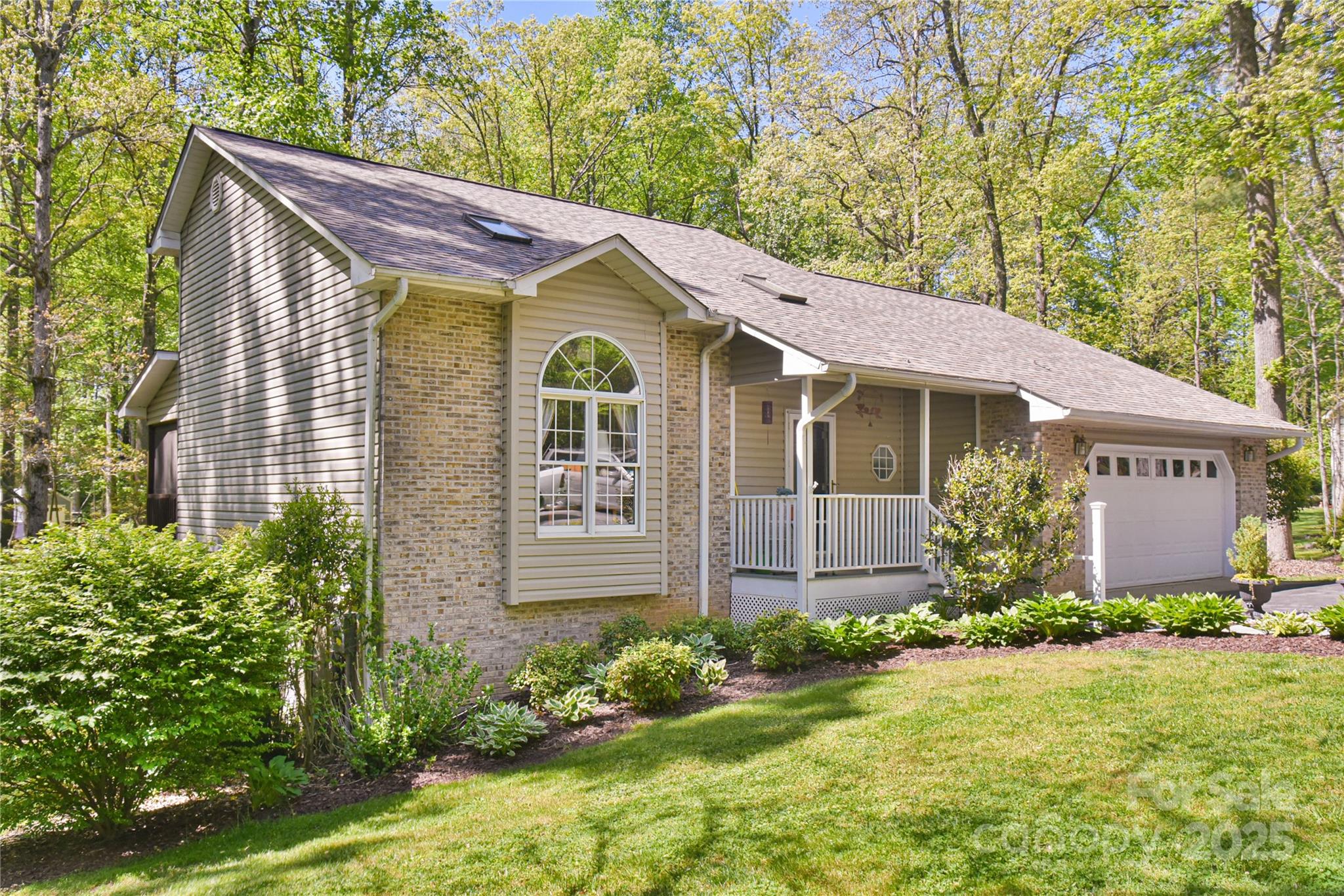 145 Fox Glen Drive Arden, NC 28704 - Photo 1 of 42 a view of a house with garden and yard