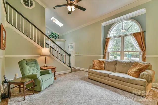 a bed room with a bed and a window