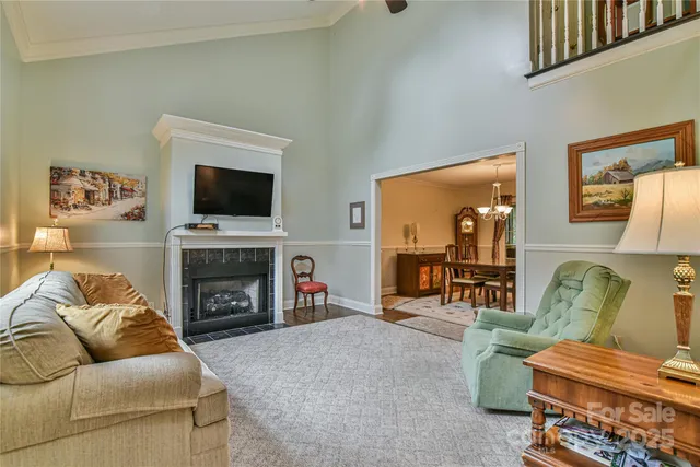 a view of a dining room with furniture and window