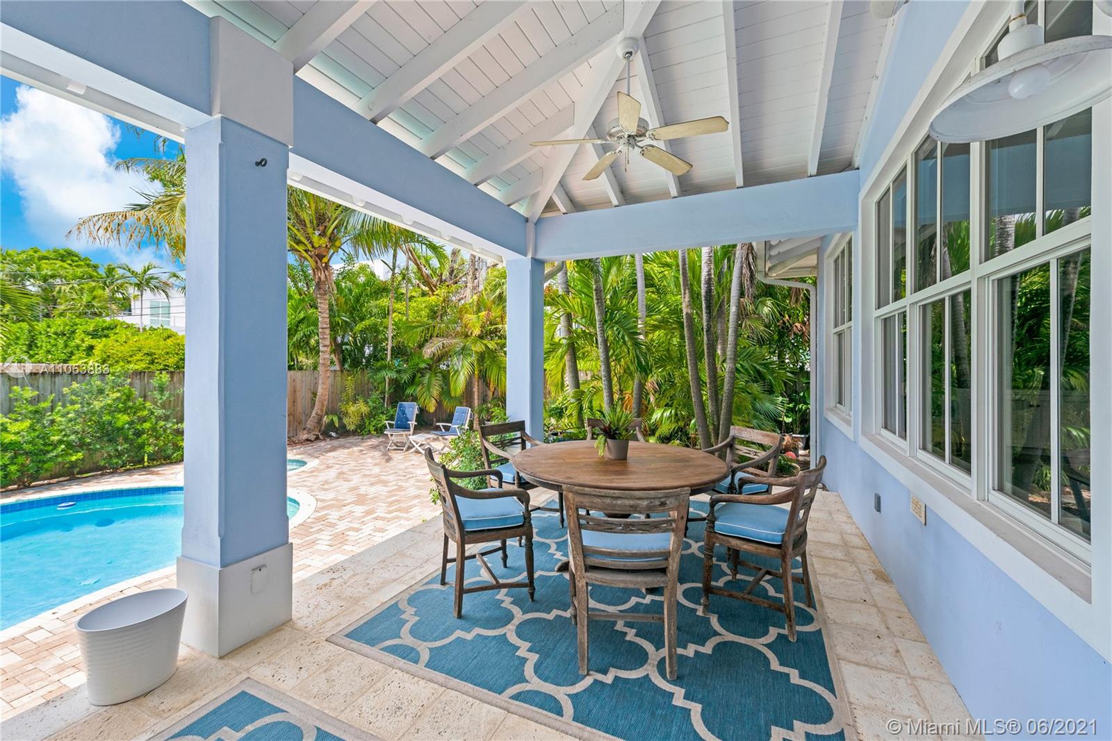 280 Woodcrest Road Key Biscayne, FL 33149 - Photo 17 of 41 a view of an outside dining space with furniture window and outside view