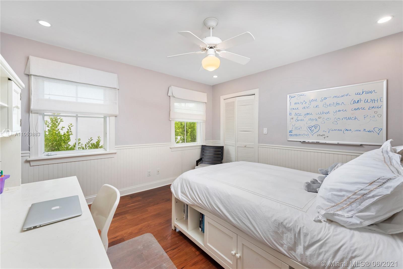 280 Woodcrest Road Key Biscayne, FL 33149 - Photo 29 of 41 a bedroom with a large bed and a window