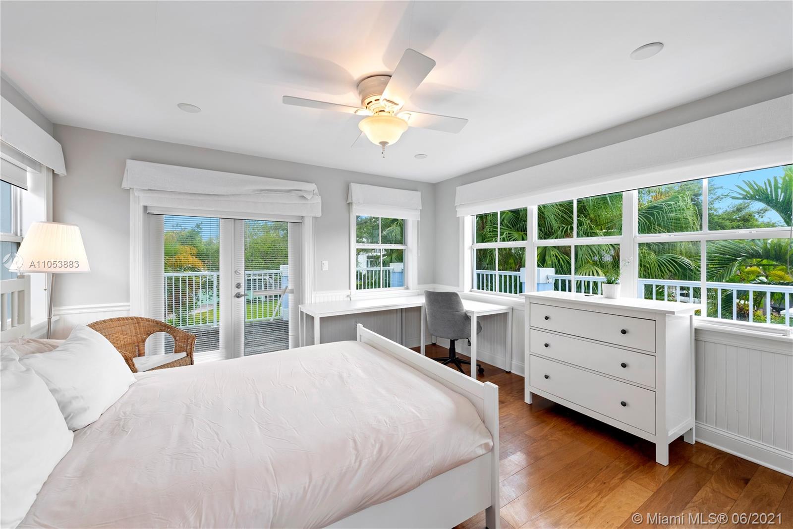 280 Woodcrest Road Key Biscayne, FL 33149 - Photo 35 of 41 a bedroom with a bed and a window