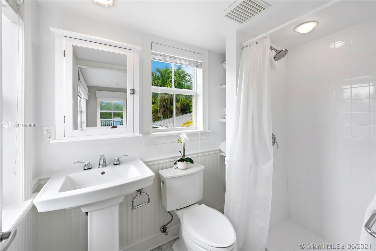 280 Woodcrest Road Key Biscayne, FL 33149 - Photo 36 of 41 a bathroom with a sink toilet and shower