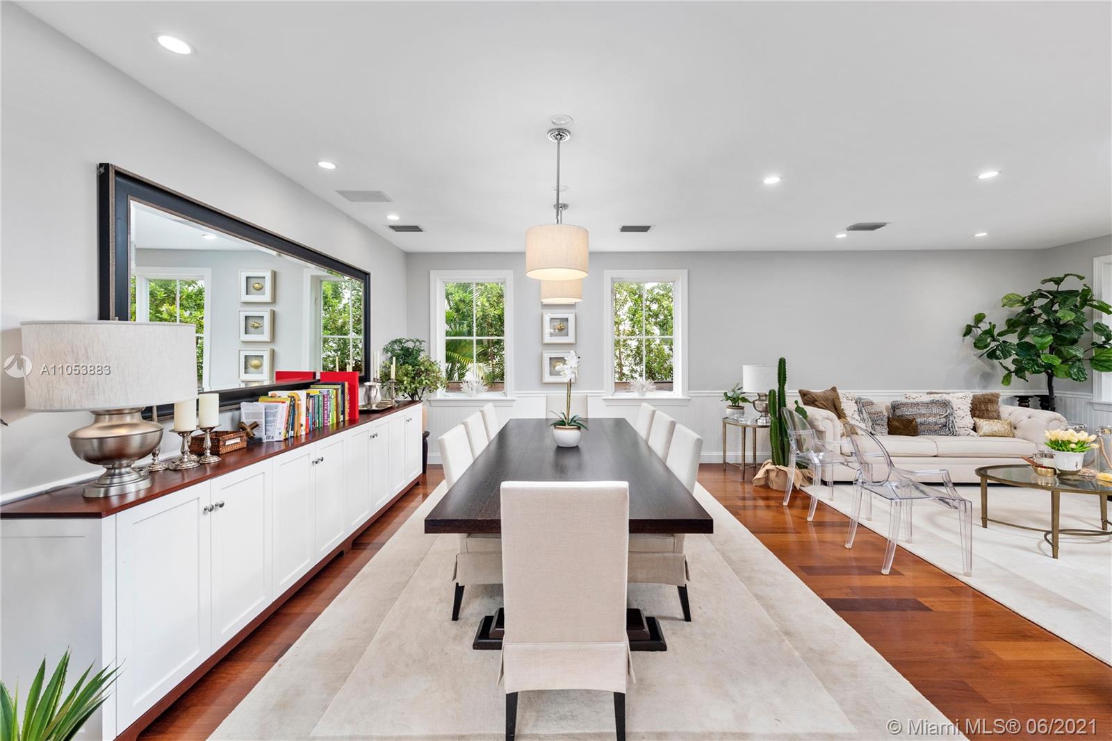 280 Woodcrest Road Key Biscayne, FL 33149 - Photo 6 of 41 a living room with furniture and a large window