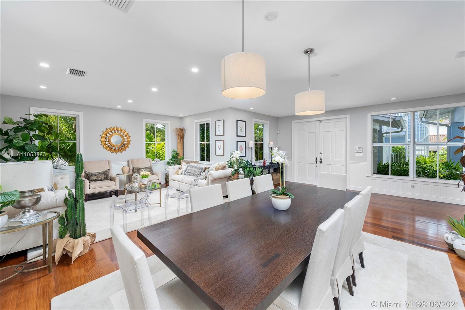280 Woodcrest Road Key Biscayne, FL 33149 - Photo 7 of 41 a living room with lots of furniture and a large window