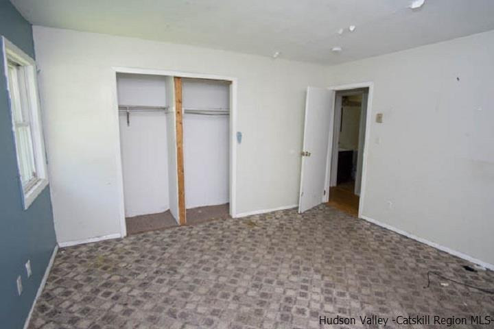 35 Aster Road Loch Sheldrake, NY 12759 - Photo 2 of 11 a view of a big room with closet and windows