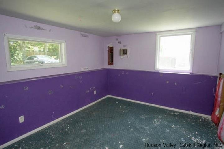 35 Aster Road Loch Sheldrake, NY 12759 - Photo 4 of 11 a view of an empty room with a window
