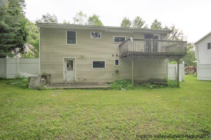 35 Aster Road Loch Sheldrake, NY 12759 - Photo 6 of 11 a backyard of a house with lots of green space