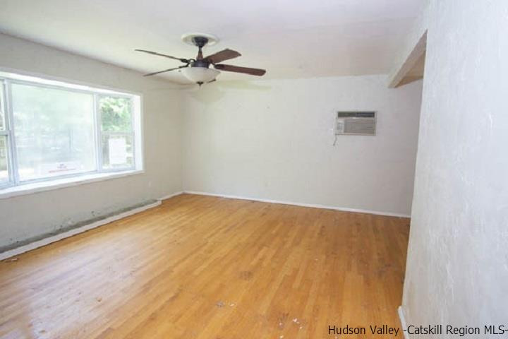 35 Aster Road Loch Sheldrake, NY 12759 - Photo 7 of 11 a view of an empty room with a window