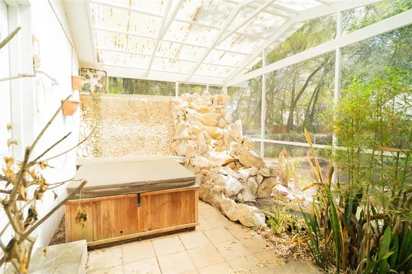 a bathroom with a bathtub and shower