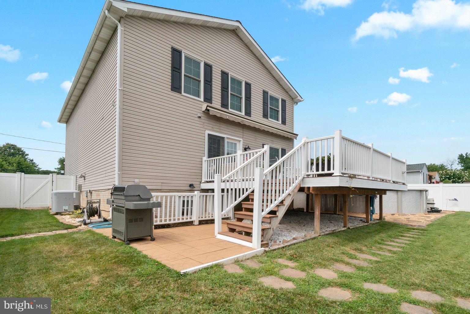 1617 Cape May Road Baltimore, MD 21221 - Photo 21 of 37 a view of a house with a yard patio and a wooden deck