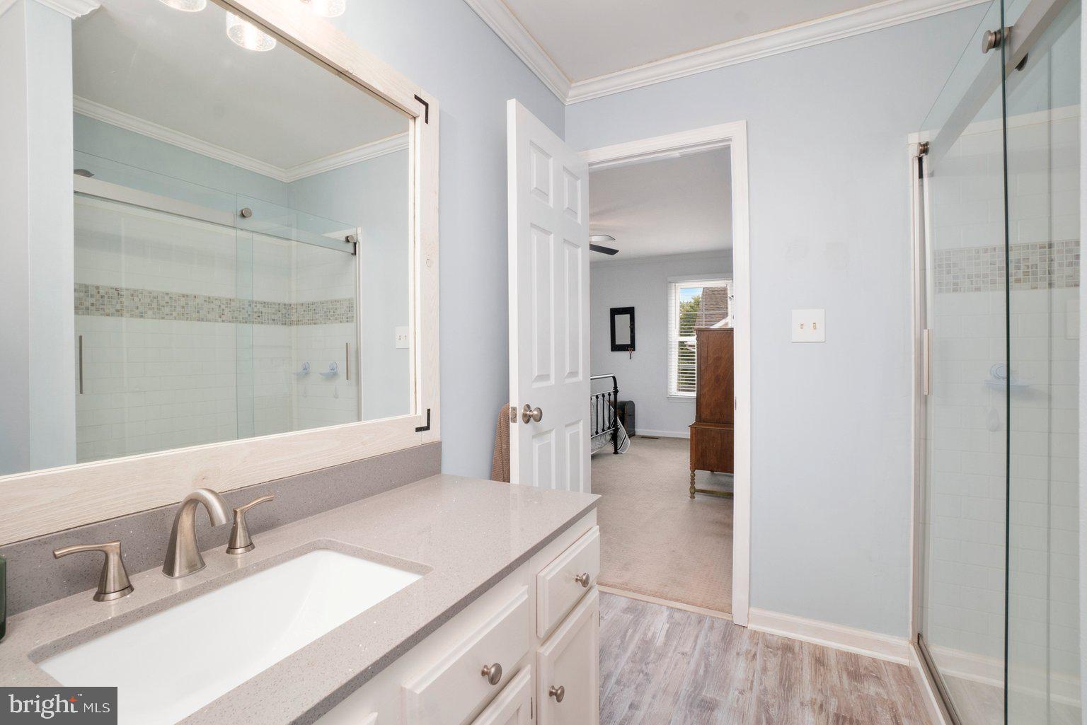 1617 Cape May Road Baltimore, MD 21221 - Photo 26 of 37 a bathroom with a sink and a mirror
