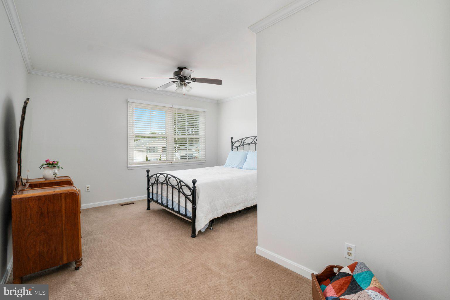 1617 Cape May Road Baltimore, MD 21221 - Photo 27 of 37 a bedroom with a bed and a window
