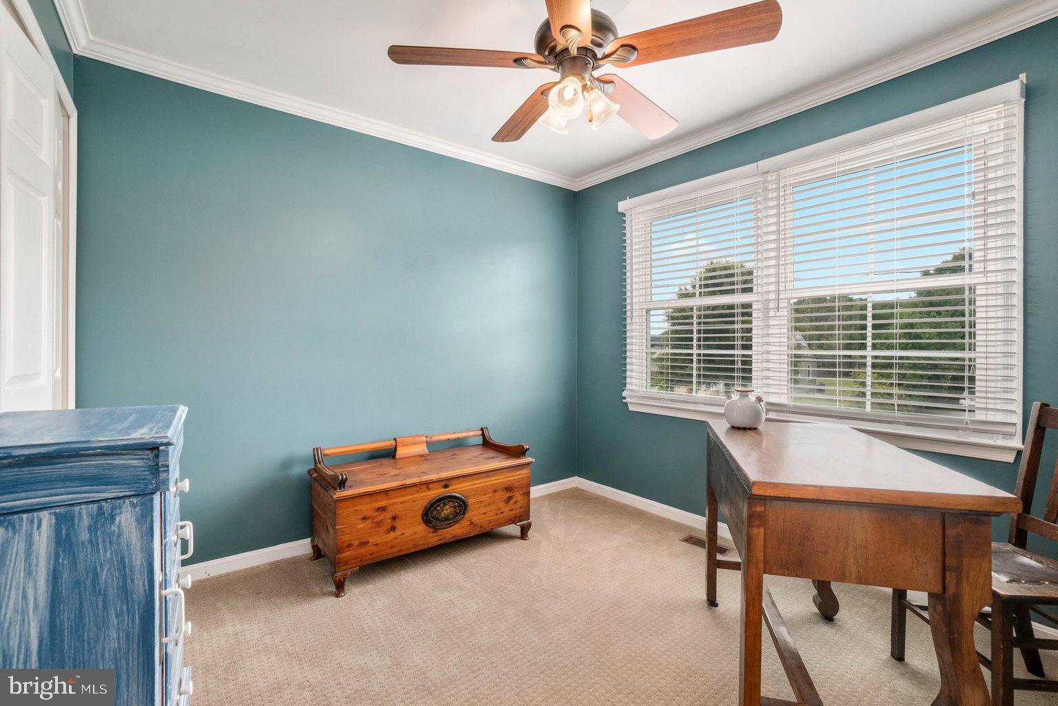 1617 Cape May Road Baltimore, MD 21221 - Photo 32 of 37 a bedroom with a bed and a window