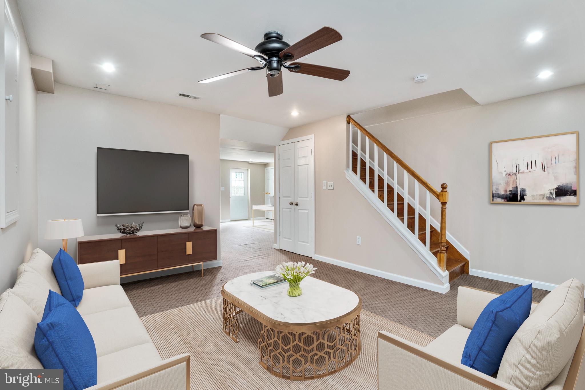 1617 Cape May Road Baltimore, MD 21221 - Photo 33 of 37 a living room with furniture and a flat screen tv
