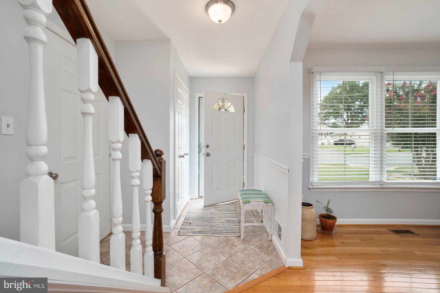 1617 Cape May Road Baltimore, MD 21221 - Photo 6 of 37 a view of a livingroom with wooden floor and window