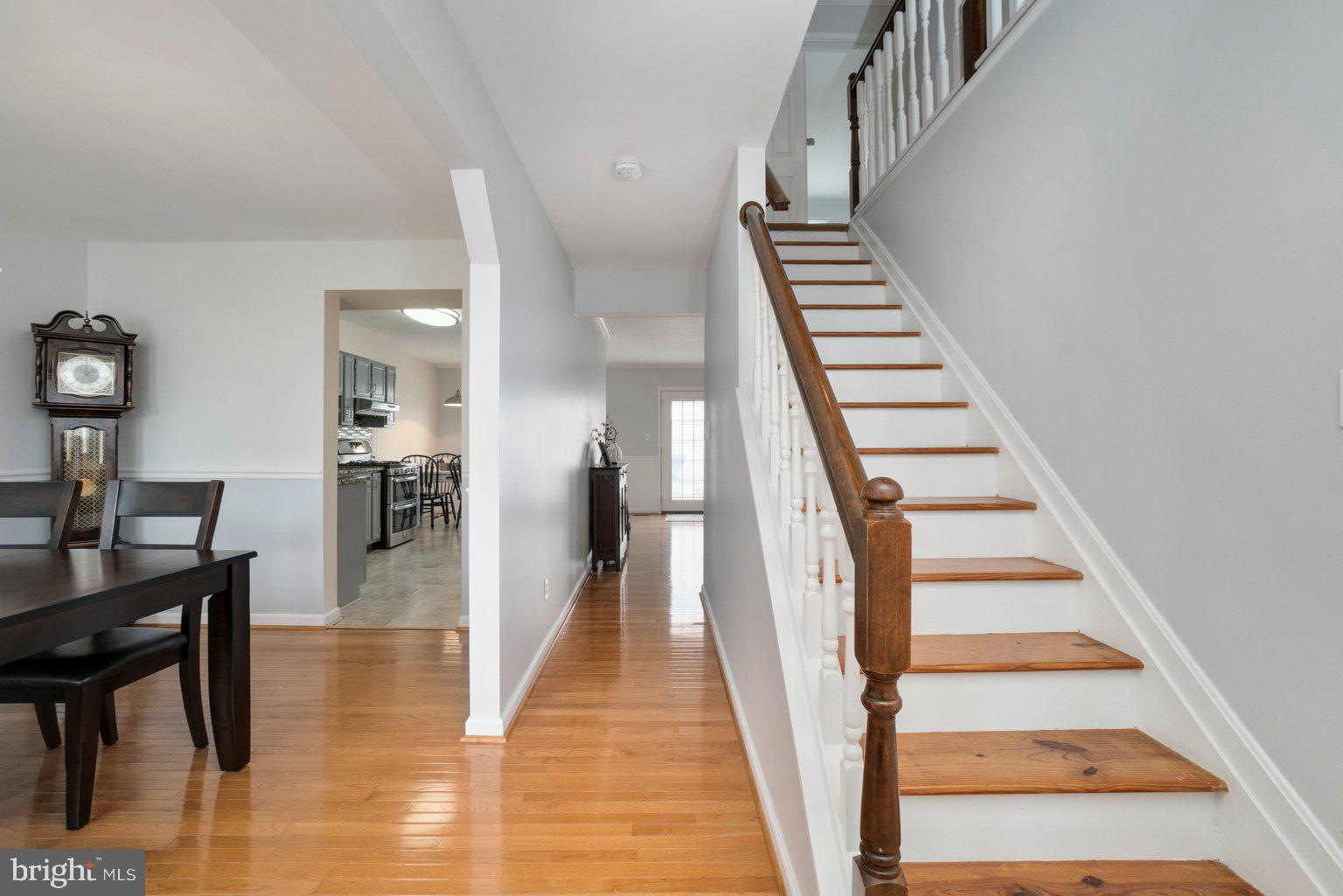 1617 Cape May Road Baltimore, MD 21221 - Photo 7 of 37 a view of entryway and hall with wooden floor