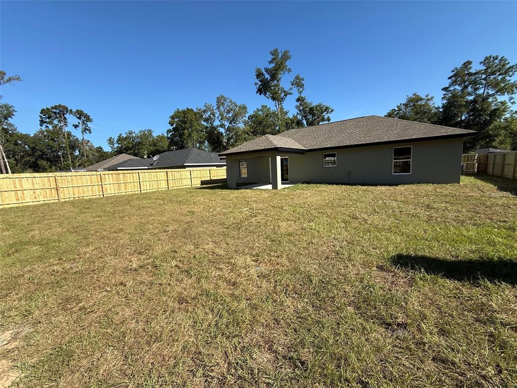 6052 Northwest 53rd Street Road Ocala, FL 34482 - Photo 26 of 26 a house view with a garden space