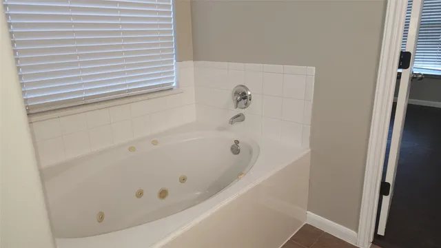 a bathroom with a bathtub