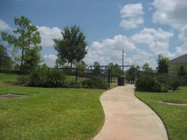a view of a garden with a fountain