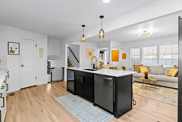 a bathroom with a sink vanity and mirror