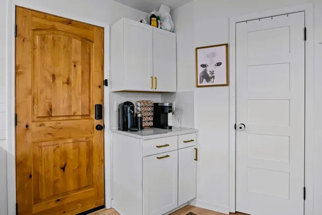 a spacious bathroom with a double vanity sink mirror and double