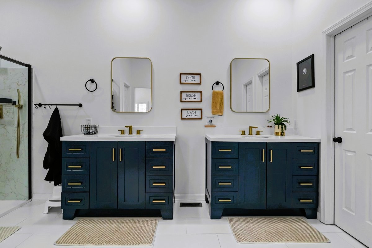 1975 Kelly Road Holladay, TN 38341 - Photo 22 of 88 a bathroom with a sink vanity and mirror