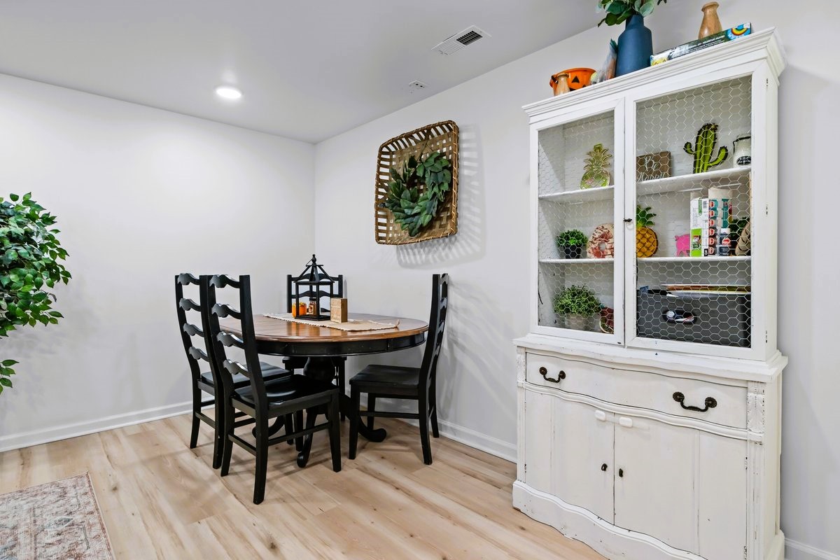 1975 Kelly Road Holladay, TN 38341 - Photo 37 of 88 a view of a dining room with furniture and wooden floor