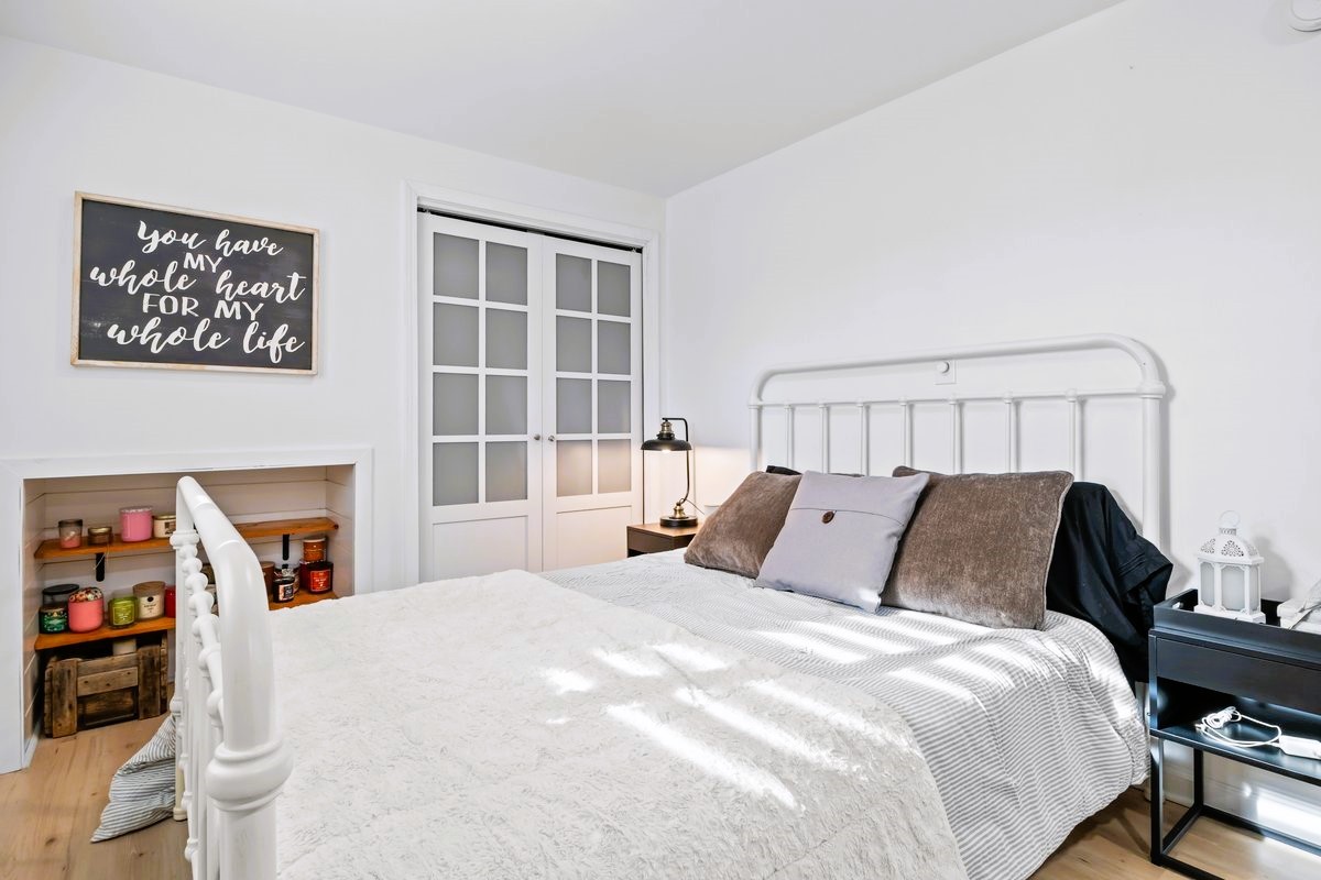 1975 Kelly Road Holladay, TN 38341 - Photo 39 of 88 a bedroom with a bed and a window