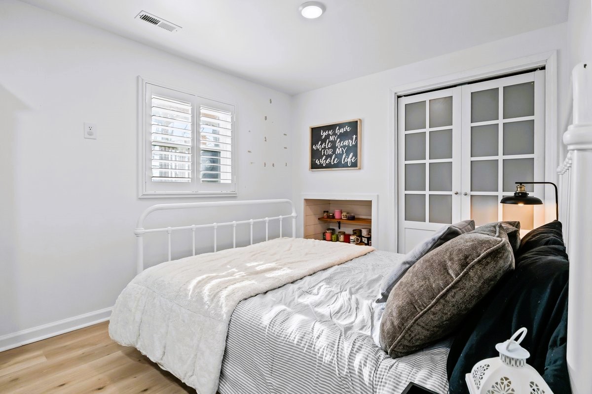 1975 Kelly Road Holladay, TN 38341 - Photo 40 of 88 a bedroom with a bed and a window