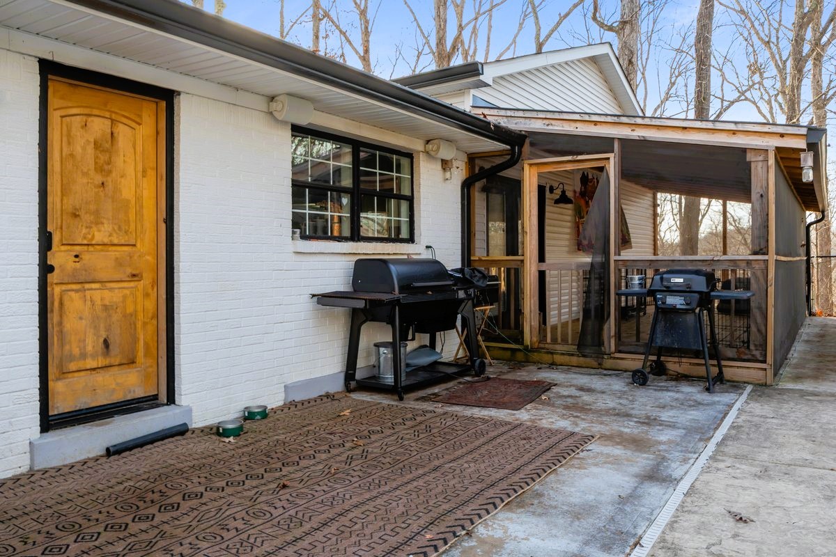 1975 Kelly Road Holladay, TN 38341 - Photo 51 of 88 a view of a dinning room with a bench in patio