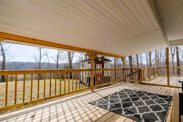 a backyard of a house with large trees