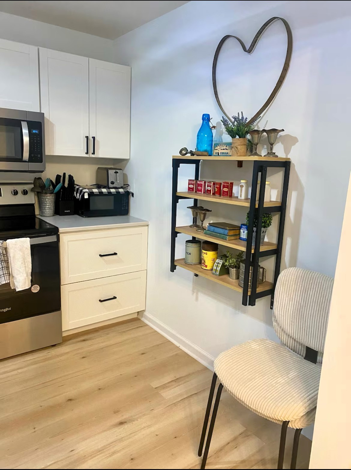 1975 Kelly Road Holladay, TN 38341 - Photo 76 of 88 a kitchen with a wooden floor and a stove