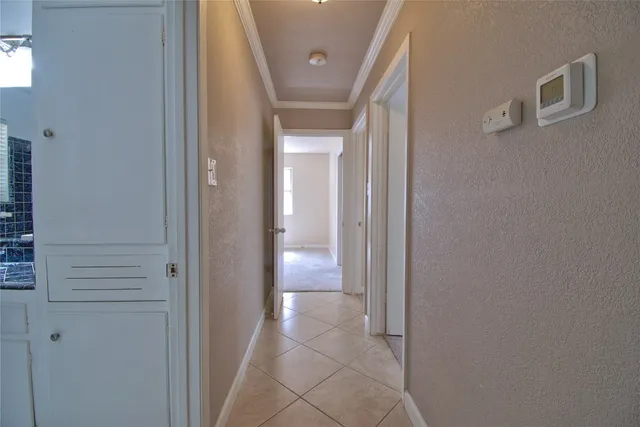 a bathroom with a granite countertop toilet a sink and bathtub