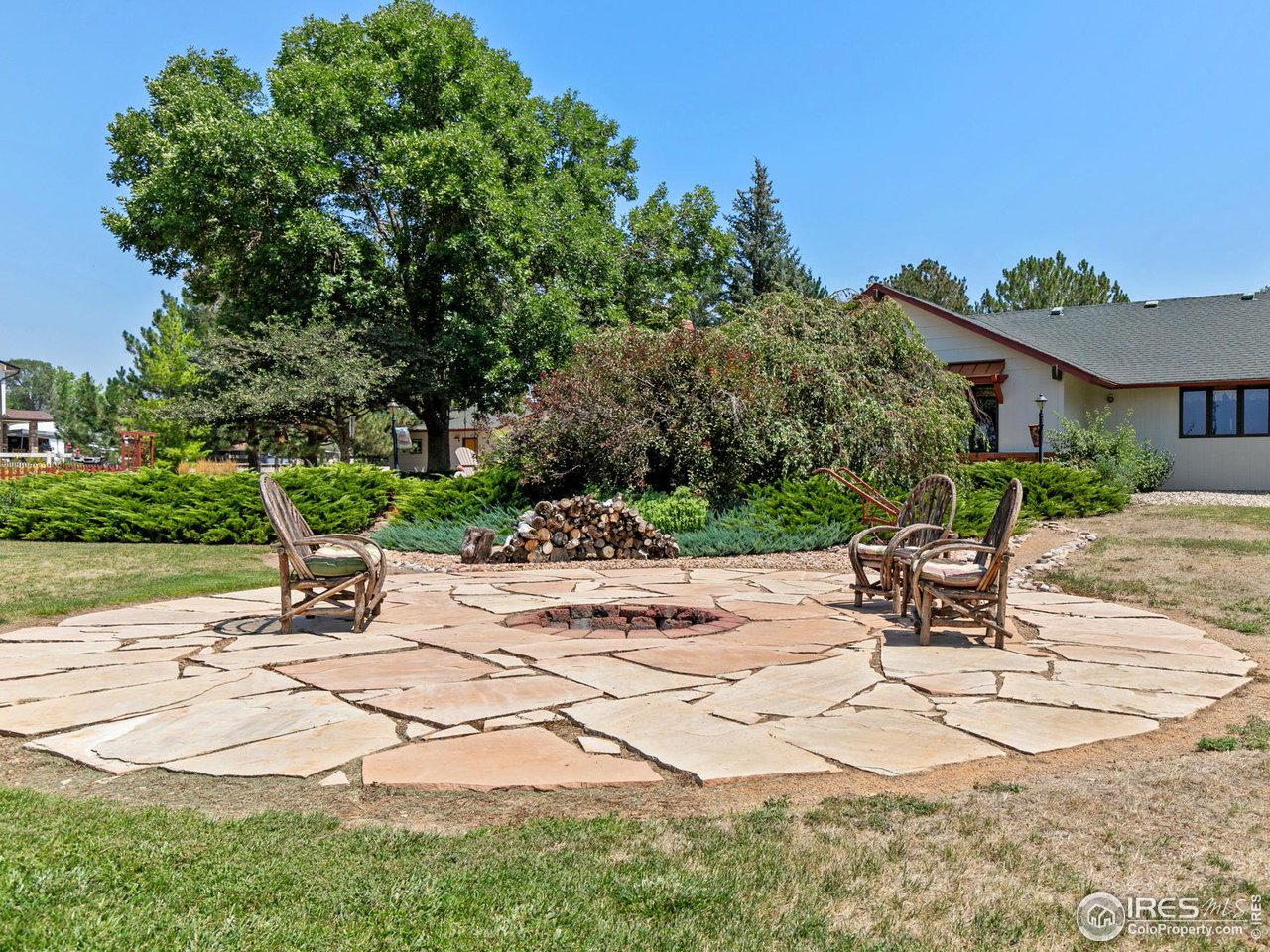 13581 Elmore Road Longmont, CO 80504 - Photo 27 of 34 Fire pit which overlooks the mountains