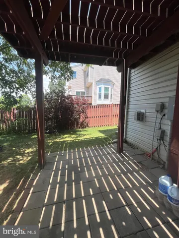 a view of backyard with wooden floor