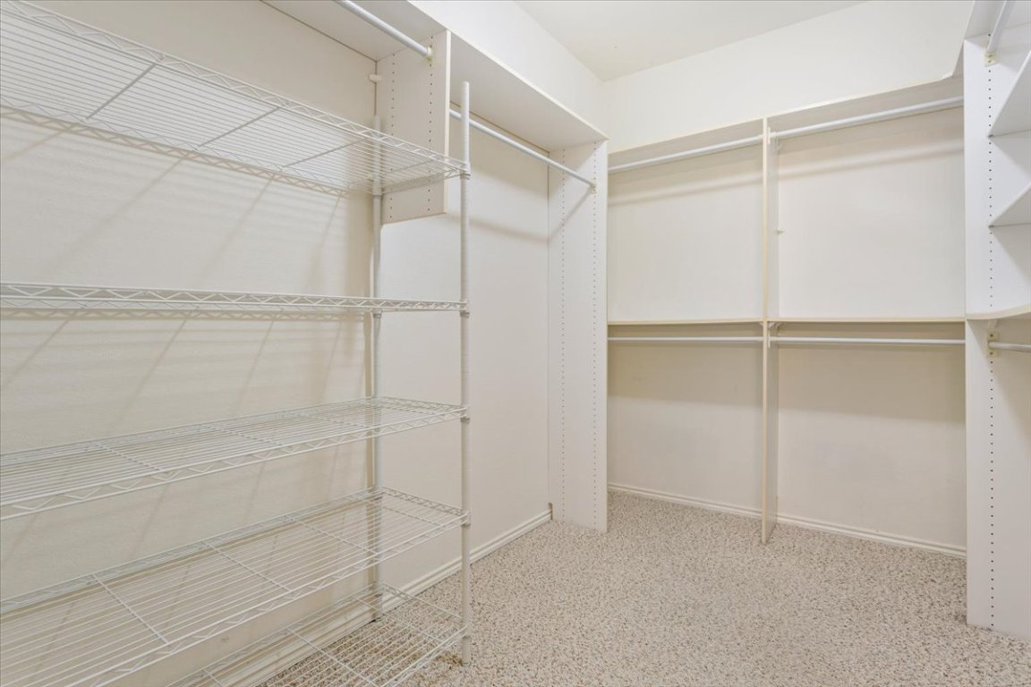 246 Red Poppy Trail Georgetown, TX 78633 - Photo 22 of 33 The spacious primary closet offers ample storage.
