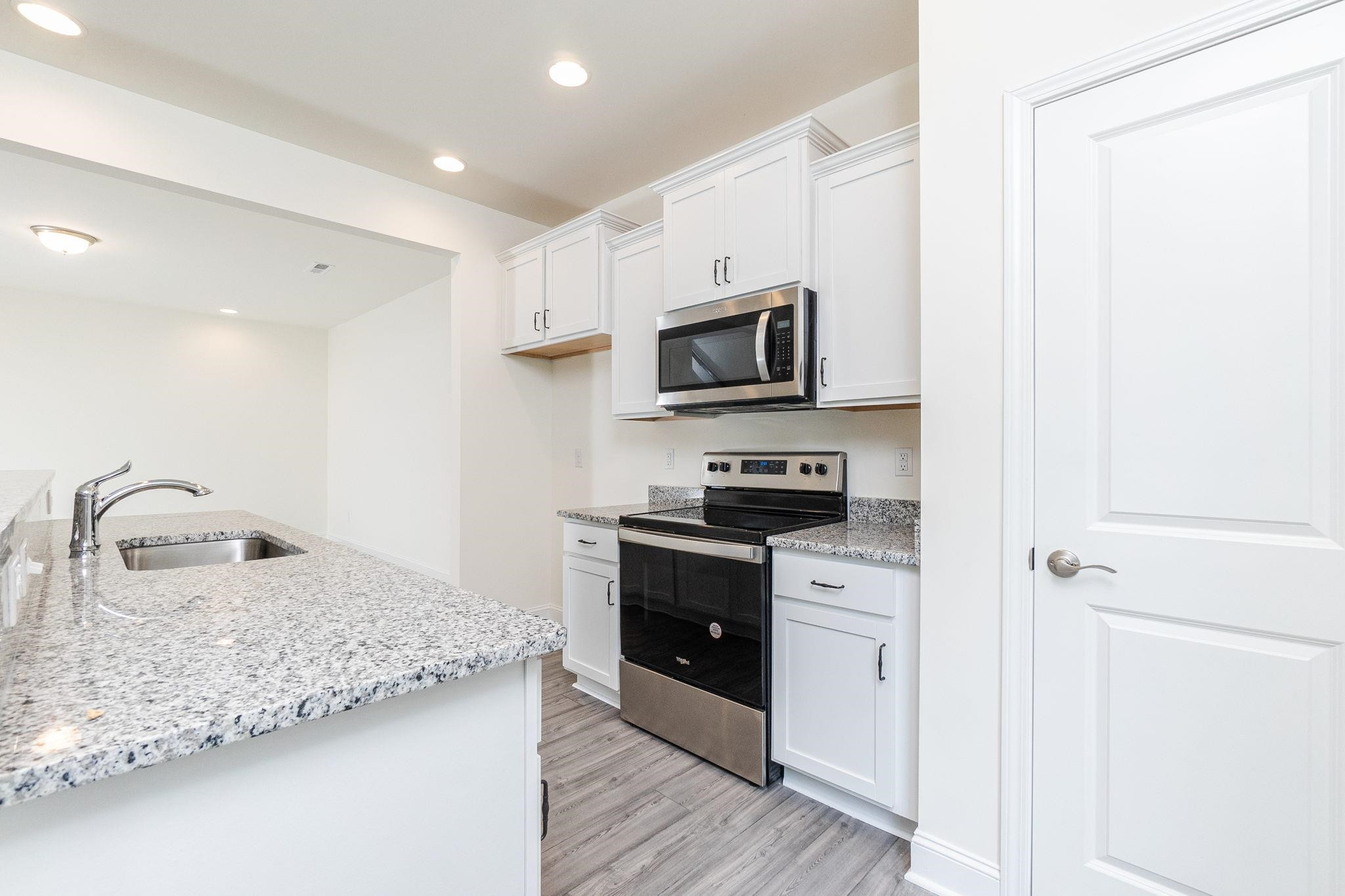 4743 Lord Fogelman Way Raleigh, NC 27610 - Photo 12 of 29 Kitcehn with View of Pantry