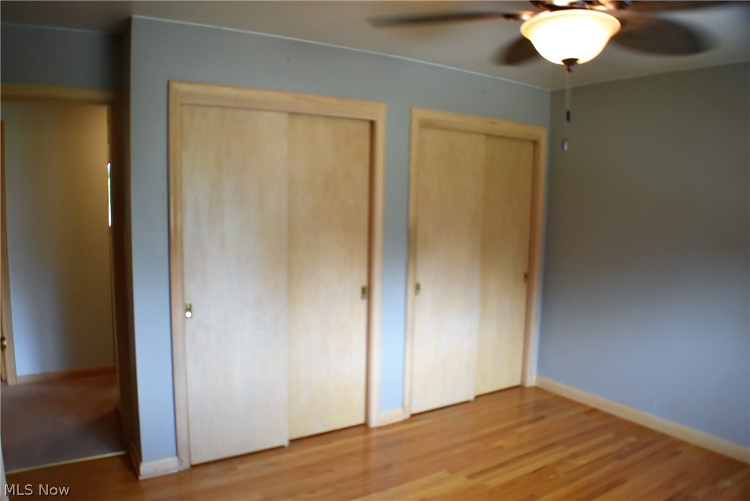 2155 Springfield Center Road Akron, OH 44312 - Photo 24 of 35 His and Her closets master bedroom