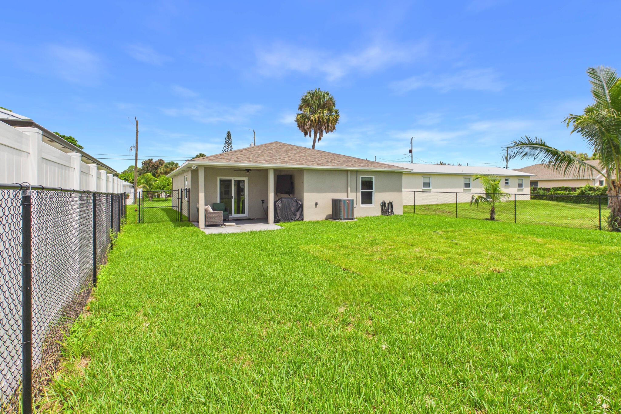 6784 3rd Street Jupiter, FL 33458 - Photo 69 of 70 EXTERIOR_BACK_3