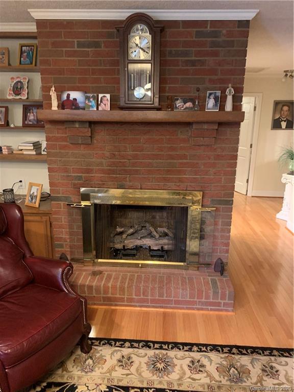 1150 Miles Road Dallas, NC 28034 - Photo 5 of 14 a living room with furniture and a fireplace