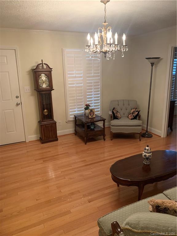 1150 Miles Road Dallas, NC 28034 - Photo 7 of 14 a living room with furniture and wooden floor