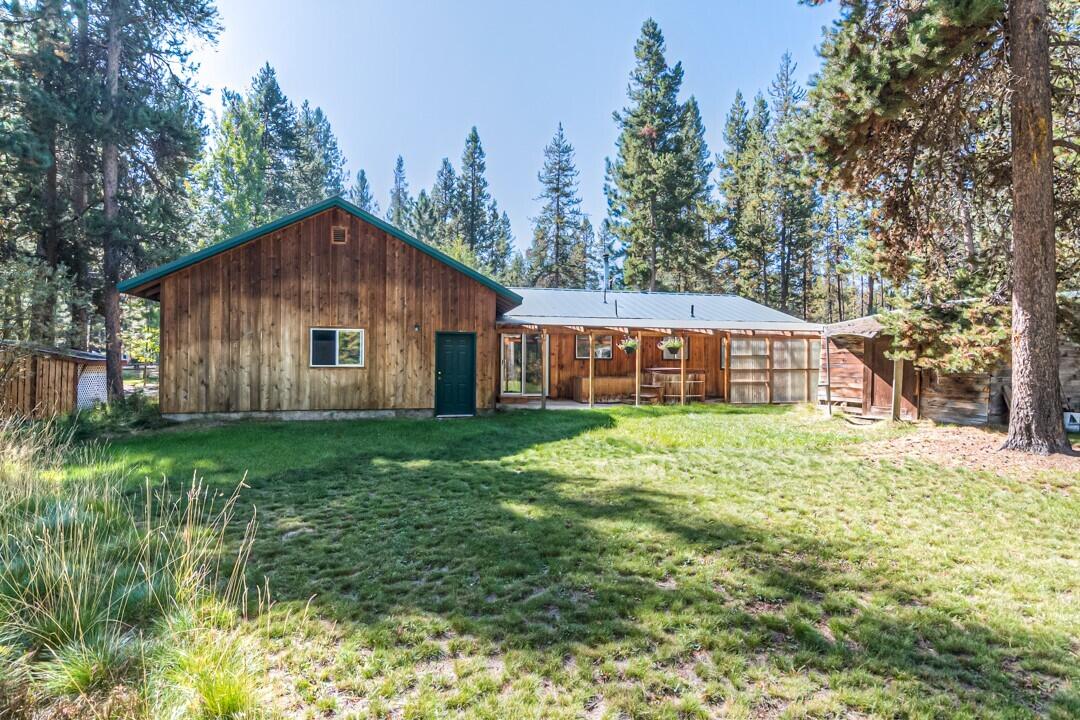 17026 Torrance Road Bend, OR 97707 - Photo 4 of 27 a view of a house with yard and sitting area