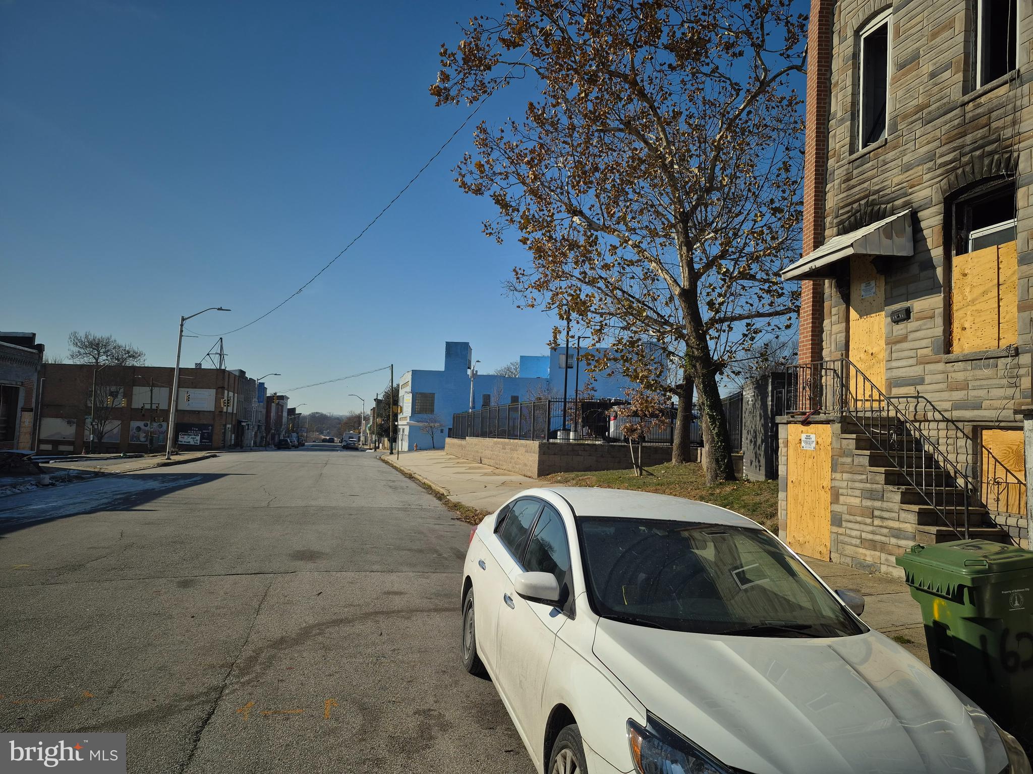 1930 Frederick Avenue Baltimore, MD 21223 - Photo 13 of 14 a view of a patio with a yard