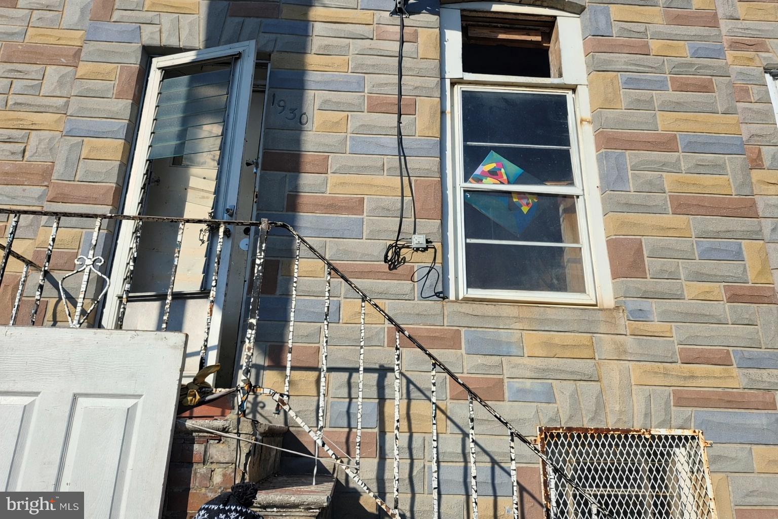 1930 Frederick Avenue Baltimore, MD 21223 - Photo 2 of 14 a view of entryway with a front door